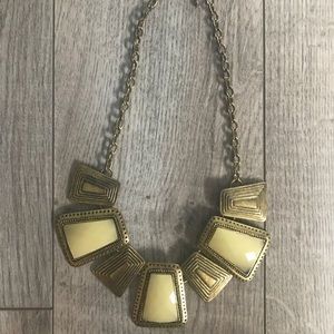 Gold and white necklace